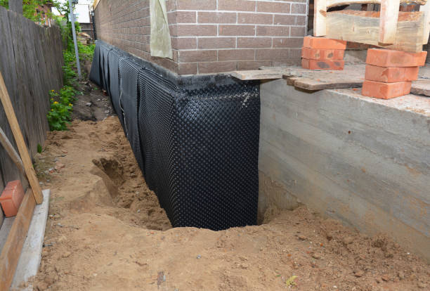 Happy homeowners after waterproofing job in Westville